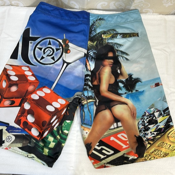 Vibrant Blue and Green Board Shorts with Tropical Design - Picture 4 of 6